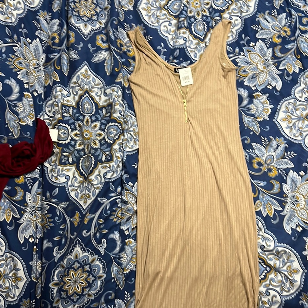 Medium size, tan dress with zipper brand new with tags
